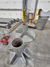 Images of steel roof supports for the Calgary Zoo Leopard enclosure getting powder coated.